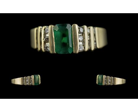 Ladies 14ct Gold Pleasing Emerald &amp; Diamond Set Dress Ring, marked 14ct to interior of shank.  The step-cut emeralds of g