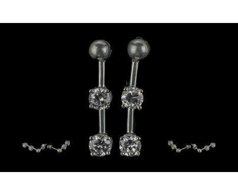 18ct White Gold Superb Quality Diamond Set Drop Earring, marked 18ct.  The modern round brilliant cut diamonds of excellent c