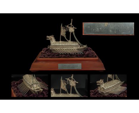 An Oriental Silver Model of a Ship. This is a model of The World First Iron Clad Warship invented by Admiral YI Soon- Shin of