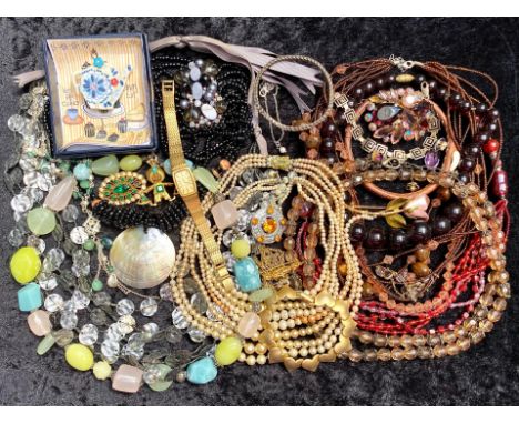 A Collection of Vintage Costume Jewellery to include mainly assorted beads and statement necklaces, plus some brooches.