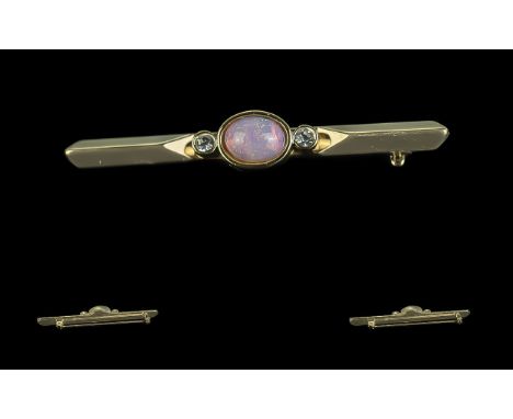 18ct Gold Attractive Opal and Diamond Set Stick Brooch. Opal of Excellent Colour, Flanked by Two Diamonds. 2.5 Inches - 6.25 