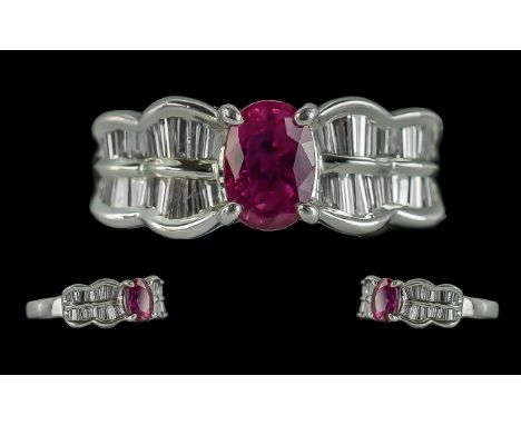 Platinum Quality &amp; Contemporary Designed Diamond &amp; Ruby Set Dress Ring, marked 900.  The central faceted Ruby of exce