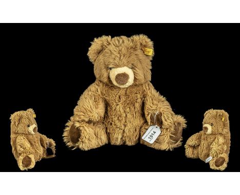 Steiff Teddy Bear, plush brown fur, measures approx. 10'' tall.  Has Steiff button and label in ear.