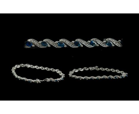 Diamond and Sapphire Bracelet Set In 9ct White Gold. Pretty White Gold Sapphire Set with Small Diamonds Set In Spacers. Appro
