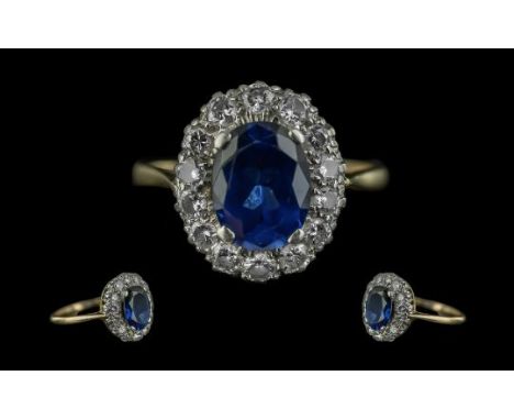 18ct Gold - Superior Quality Blue Sapphire and Diamond Set Ring. Flower head Setting. Full Hallmark to Interior of Shank. The