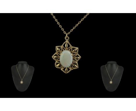 9ct Gold Ornate Opal Set Open-Worked Pendant with Attached 9ct Gold Chain. Both Marked 9ct. The Large Oval Shaped Opal of Goo