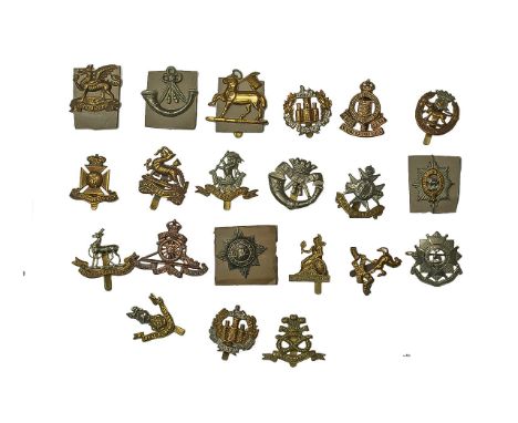 A Good Collection of British Early Military Regimental Cap Badges ( 21 ) In Total. Comprises 1/ The Buffs. 2/ Oxfordshire and