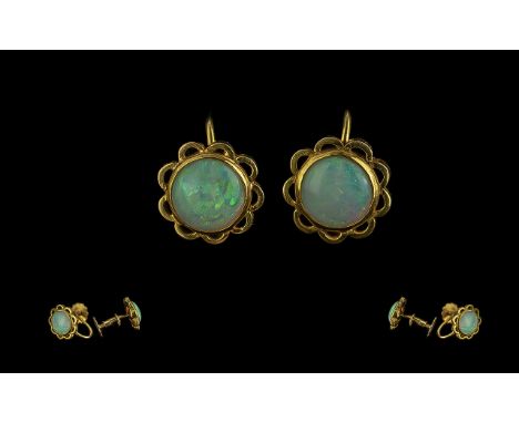 18ct Gold - Attractive Pair of Opal Set Earrings. Marked 18ct. The Round Opals of Excellent Colours - Each Opal Est 1.00 ct x