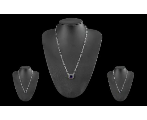 Amethyst Pendant and 'Paperclip' Necklace, a 5ct, octagon cut amethyst of deep purple colour, in an Art Deco style, platinum 