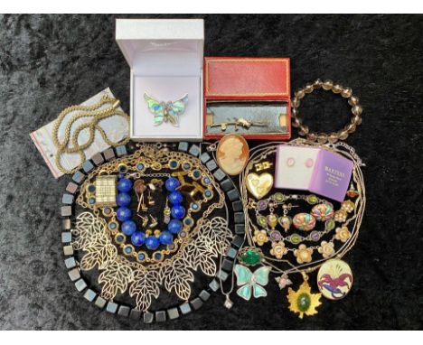 A Collection of Vintage Costume Jewellery to include assorted beads, brooches and necklaces, enamel pendant and chain, butter