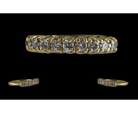 18ct Gold Attractive Diamond Set Half Eternity Ring, Full Hallmark to Interior of Shank. The Round Brilliant Cut Diamonds of 