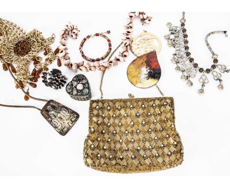 A collection of costume jewels, including a pair of shell gilt metal ear clips, enamel pendants, heart shaped box, a pair of 
