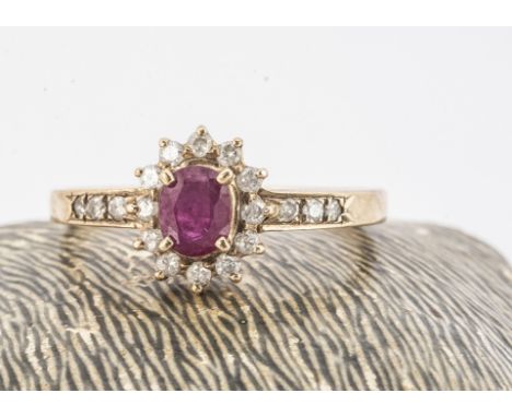 A c1970s 9ct gold and ruby ring, 1.8g and size O, set with clear stones 