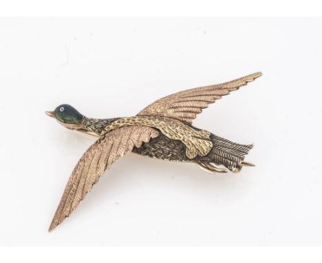 A 9ct gold three coloured gold and enamel game bird brooch, modelled flying, 3.5 cm by 4 cm, marked to reverse 3.8g 