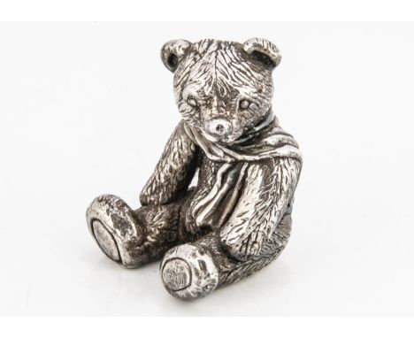 A modern silver filled Teddy bear, 6cm high 