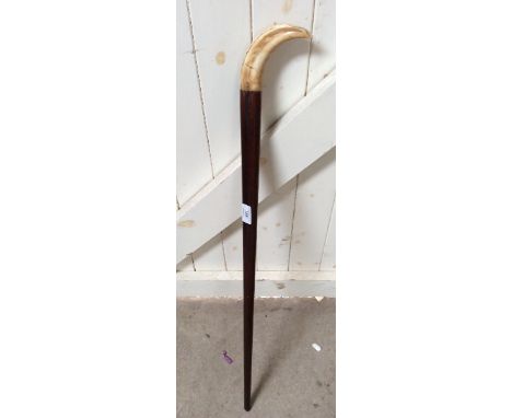 A walking stick with warthog tusk handle, 90cm 