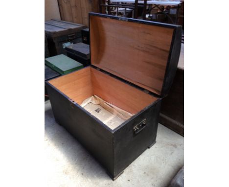 A Victorian leather covered domed travelling trunk, flanked by iron handles, 79cm wide 