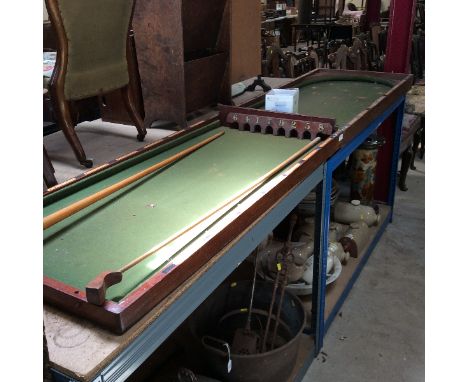A 19th Century mahogany folding bagatelle board, and some accessories 