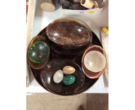 A small spinach green jade bowl, 6.5cm dia.; other hardstone bowls; a malachite egg and other hardstone eggs