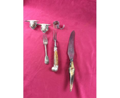 A silver mounted horn handled carving fork. a horn handled carving knife; a George III silver fork; a silver napkin ring; and