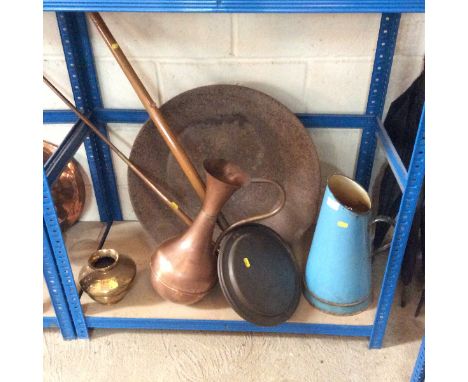 A large iron cream pan; a copper warming pan with wooden handle; a copper post horn; an enamel jug; a copper pitcher and a br