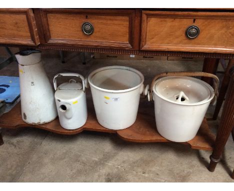 An enamel water jug, stamped GR; an enamel hot water can and two slops pails