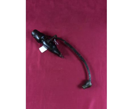 A Victorian novelty counter balanced rocking figure, man with a pipe, 37cm overall