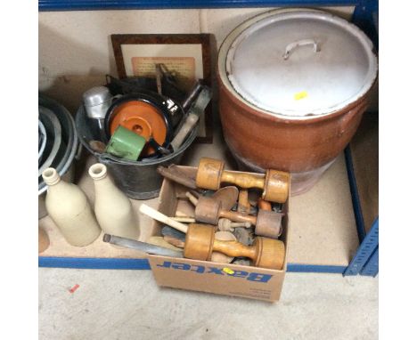 A collection of kitchen ware; aluminium pans, enamel ware; wooden bread boards; cutlery etc.