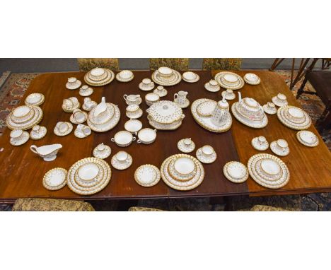 A Spode Fleur de Lys Comprehensive Dinner, Tea and Coffee Service, including a tureen coffee pot, tea pot, soup bowls, dinner