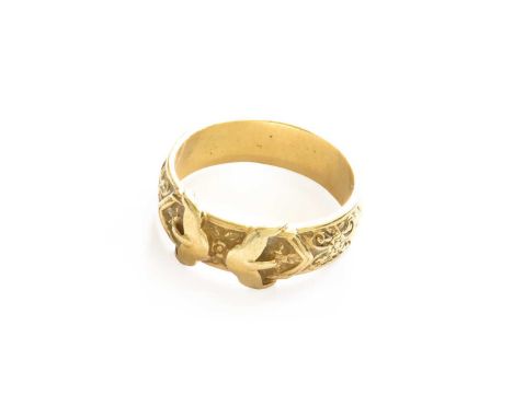 A 9 Carat Gold Buckle Motif Ring, finger size Z+2The ring is in good codition with scratches commensurate with age and wear. 