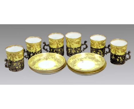 A Set of Six Edwardian Staffordshire China Silver Mounted Demitasse Cups and Saucers, yellow ground, with gilt printed trelli