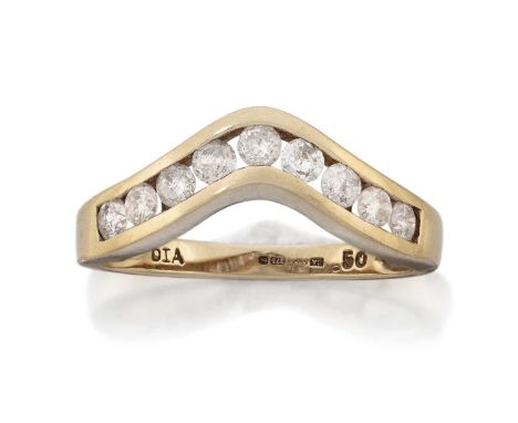 A 9 Carat Gold Diamond Wishbone Ring, nine round brilliant cut diamonds in a yellow channel setting, to a plain polished shan