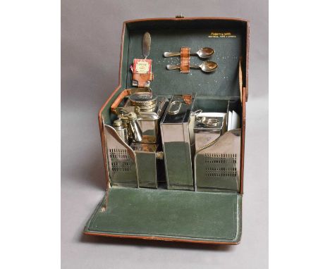 A Tan Leather Cased Travelling Picnic Set, maker Mappin & Webb, Montreal Paris & London, fitted with chrome plated accoutreme