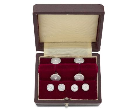 An 18 Carat White Gold Diamond and Mother-of-Pearl Dress Stud and Cufflink Suite , comprising of four dress studs and a pair 