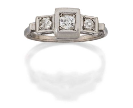 A Diamond Three Stone Ring, the graduated old cut diamonds in white claw settings, within square borders, to a tapered should