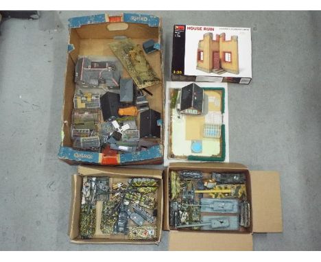 A collection of over 20 scenic accessories and building suitable for model railway / military modelling. Lot also contains a 