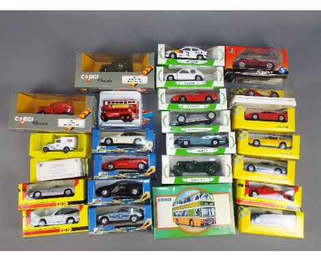 Corgi, Solido, Maisto - Approximately 24 predominately boxed diecast model vehicles in various scales. Lot includes Solido Ag