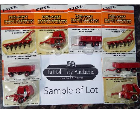 ERTL - approximately 24 diecast 1:64 scale model farm implements, wagons, bottom plows (ploughs) and round balers, all appear