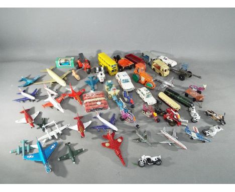 Dinky, Matchbox and Others - A collection of over 30 unboxed diecast and plastic model vehicles. Lot includes Dinky #279 Avel