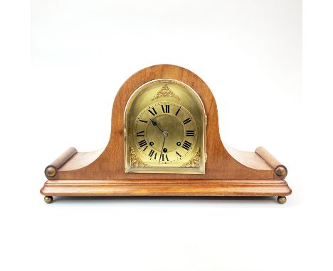 A brass dial mahogany mantle clock with chiming movement, W. 55cm. H. 30cm.