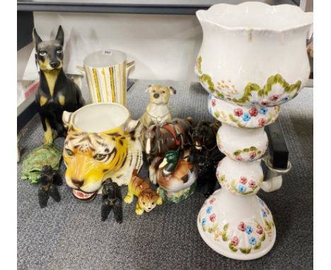 A 1960's ceramic vase, H. 35cm, together with a planter and stand and a group of ceramic figures.