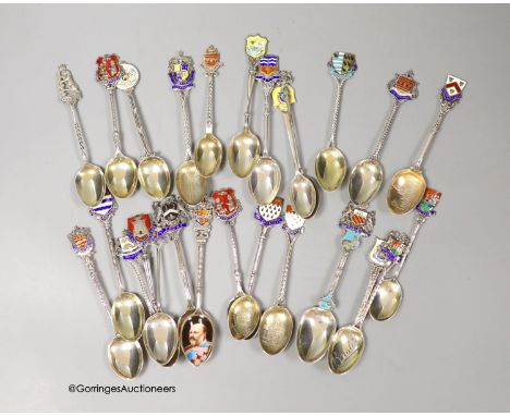   Twenty five assorted 20th century silver and enamel souvenir spoons, including Brighton, Bournemouth, Eastbourne, Chicheste