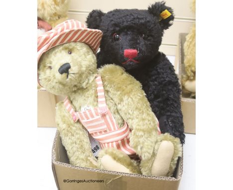   A Black Classic Steiff, 17in. with Blond classic, dressed not original clothes