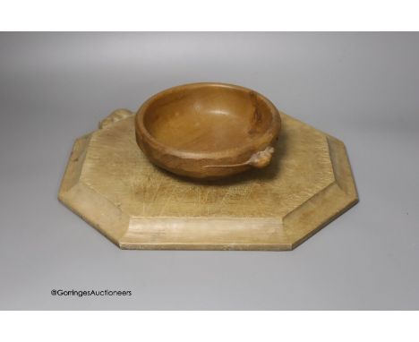   A Mouseman octagonal cheese board, 30cm, and a small Mouseman bowl, 15cm