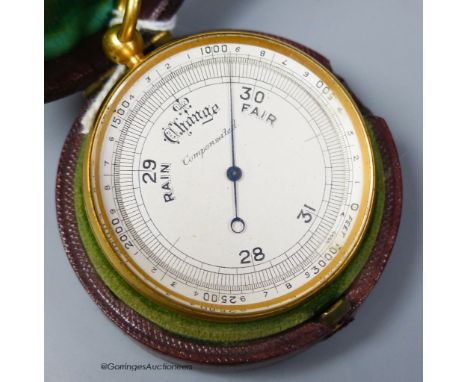   A 19th century gilt brass cased pocket barometer with compass, cased