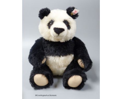   A Panda Steiff, certificate and bag