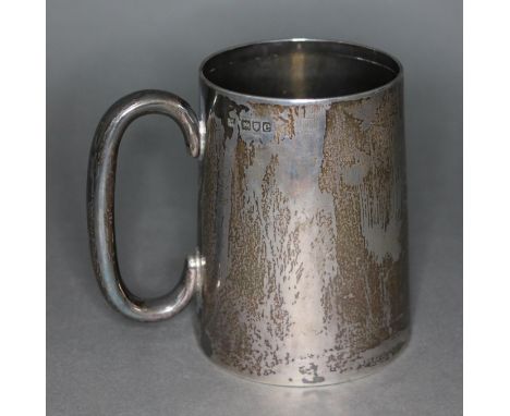 A late Victorian silver tankard, Rupert Favell, London 1900, height 11.5cm, wt. 9ozt.&nbsp;Condition - appears to have been '