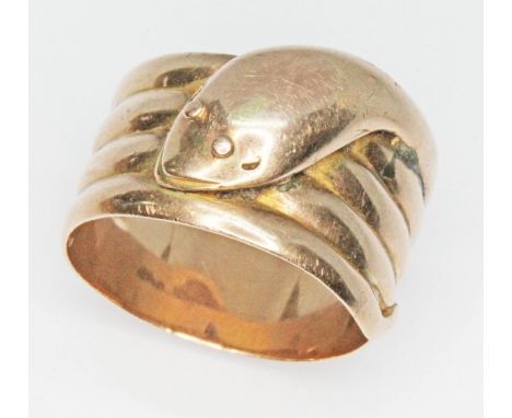 A 9ct gold ring formed as a coiled snake, hallmarked 9ct gold, sponsor mark indistinct, Birmingham 1915, wt. 6.4g, size S/T.&