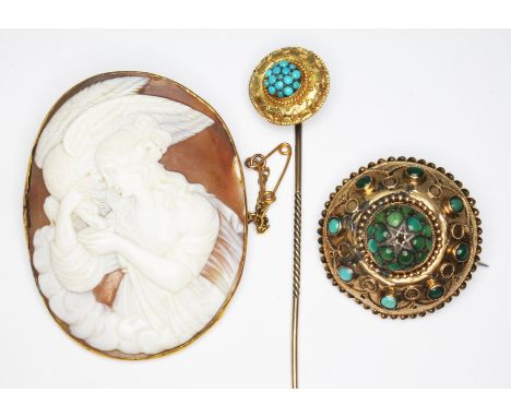 Antique jewellery comprising a shell cameo brooch marked '9ct', a Etruscan Revival brooch set with turquoise marked '15c' and