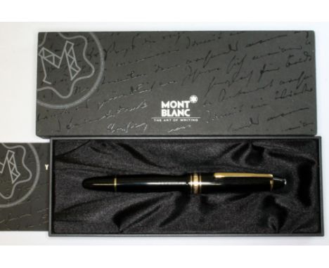 A Mont Blanc Meisterstuck rollerball pen in black and gold plate, circa 1995, serial no. CM1128781, with box and guide.